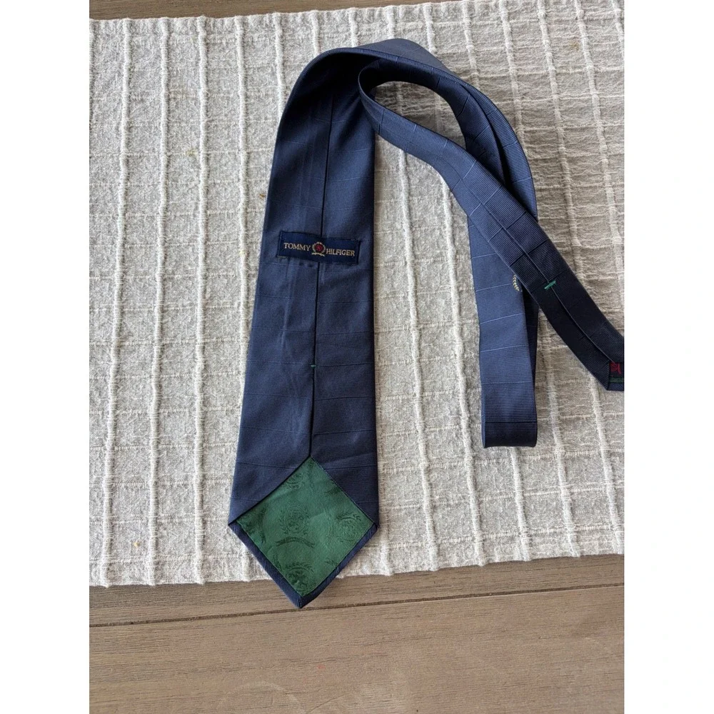 90's Tommy Hilfiger navy blue crest silk neck tie, made in the USA